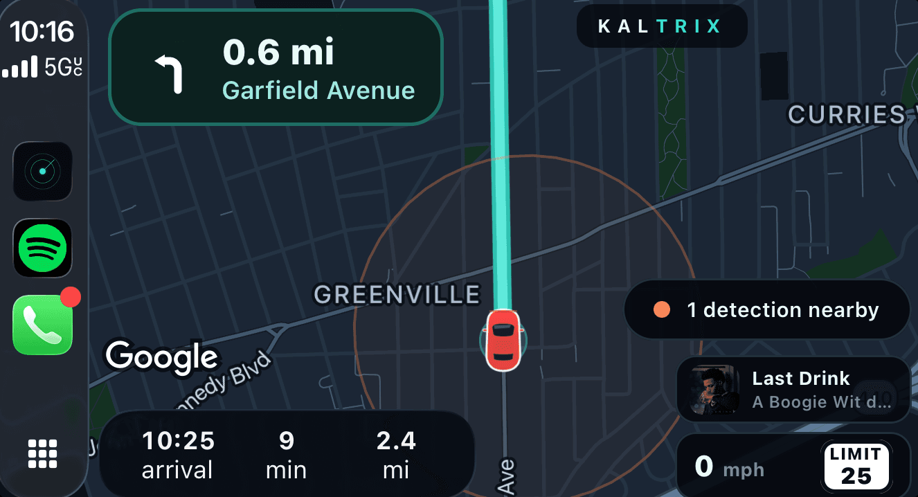 Kaltrix on a CarPlay display: the dark map with the route drawn in cyan, a turn card for Garfield Avenue, a nearby-detection alert, current speed beside the posted limit, and Spotify playing in the corner